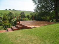 Softwood decking treated with a Cuprinol stain.